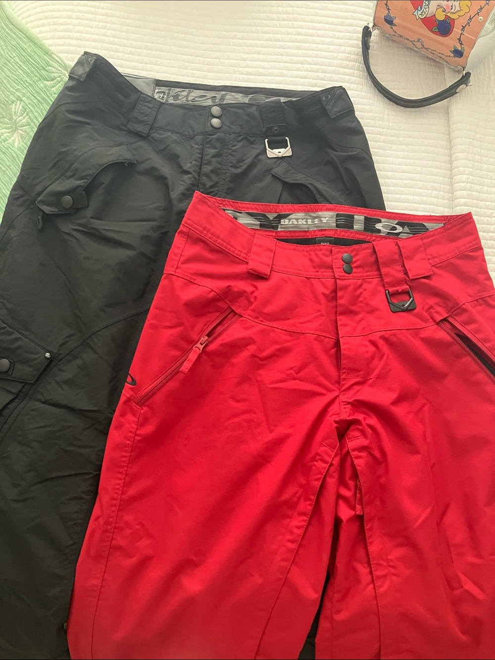 2 pair Oakley womens Red and Black Snow Pants - Active Winter Bottoms.
